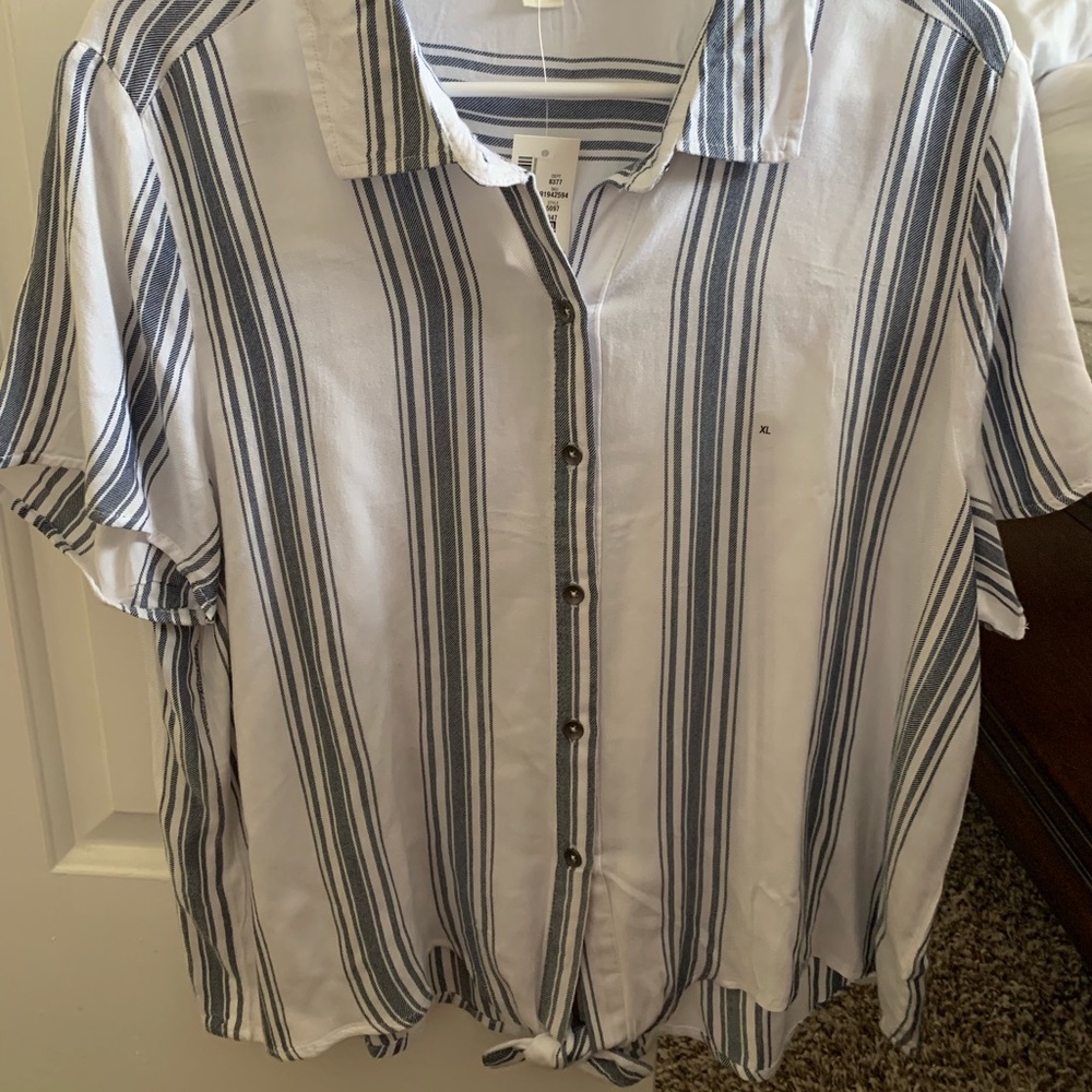Dress shirt/ button down top.